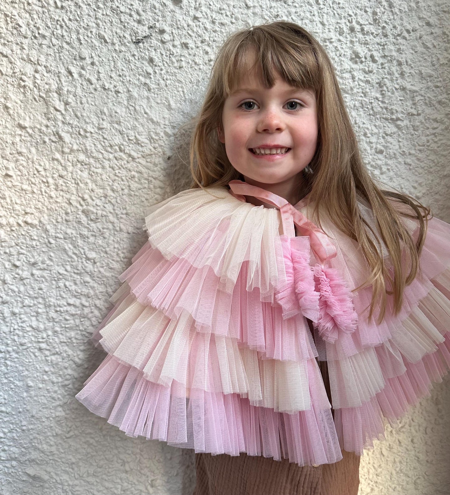 Kid size pink/cream ruffle cape
