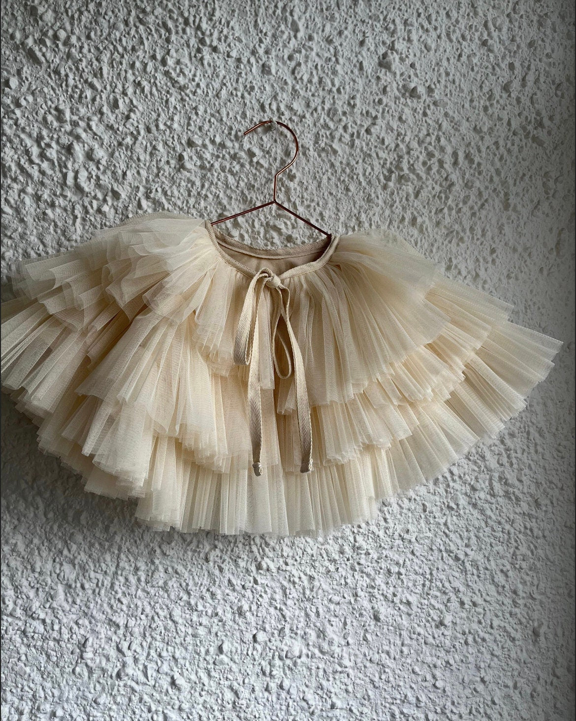 cream ruffle mini cape
