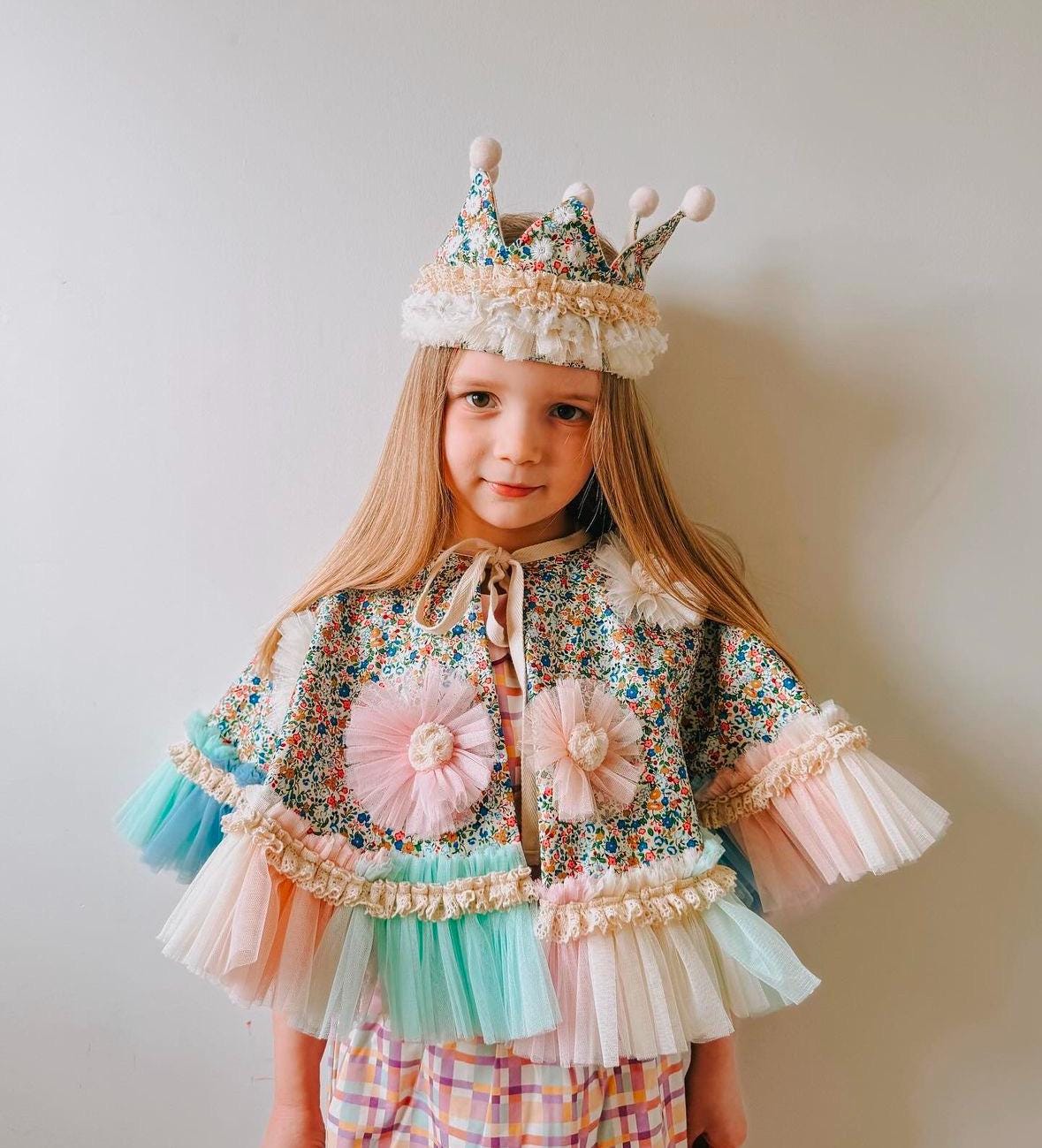 Ditsy floral frill cape in blue