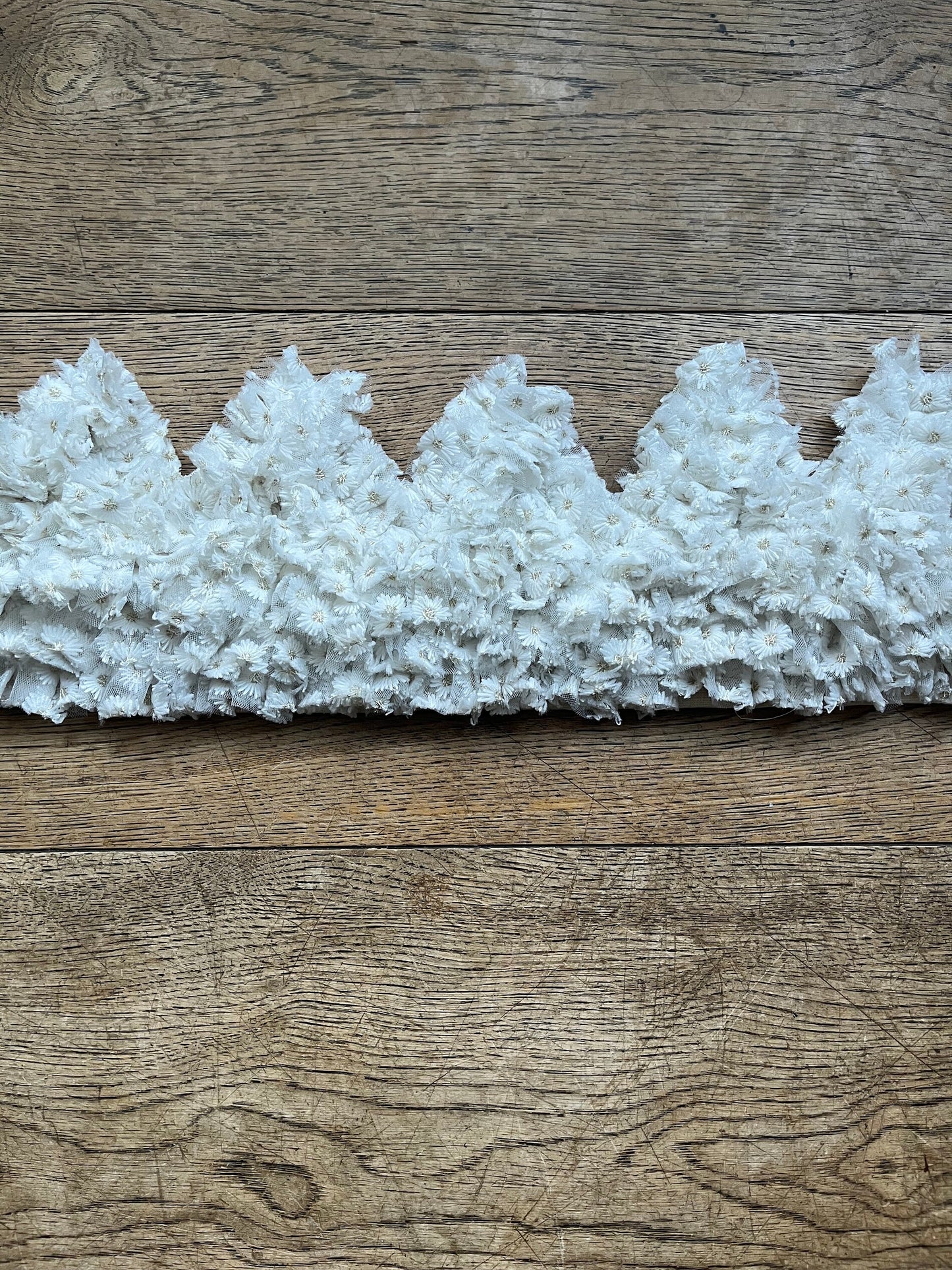 White embroidered daisy ruffle crown