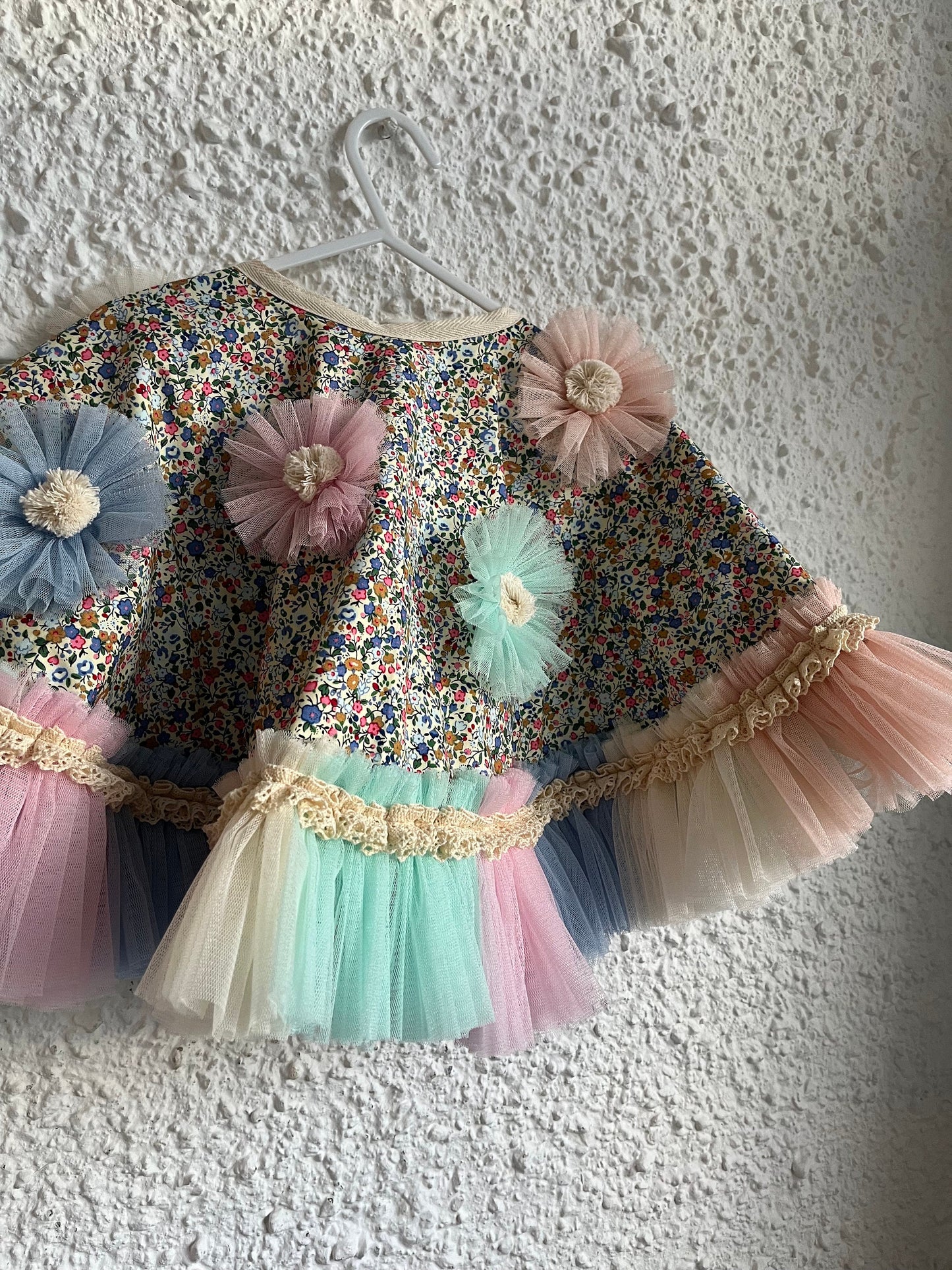 Ditsy floral frill cape in blue