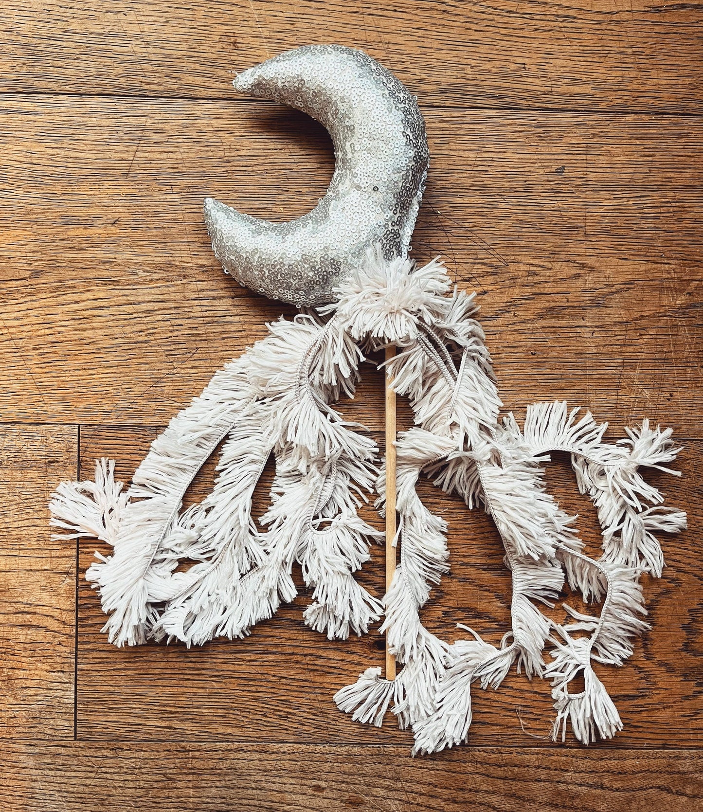 silver sequin moon wand with shaggy tassels