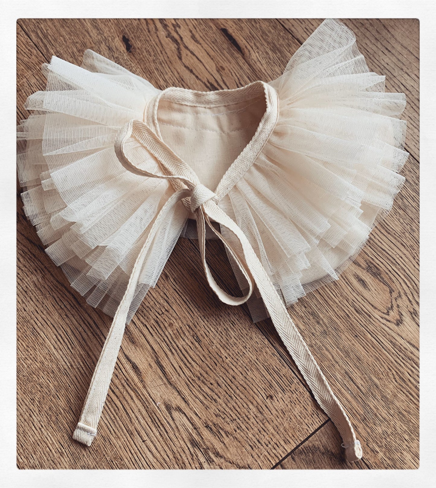 Cream ruffle collar