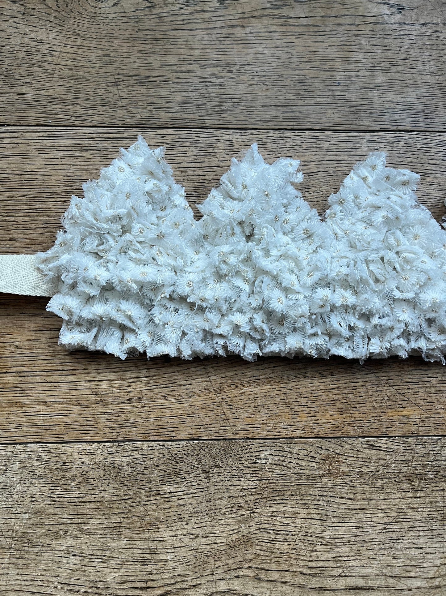 White embroidered daisy ruffle crown