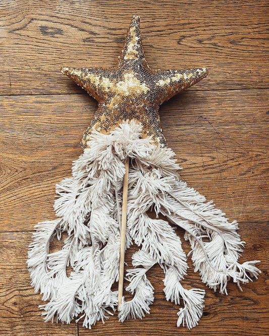 gold sequin wand with shaggy tassels