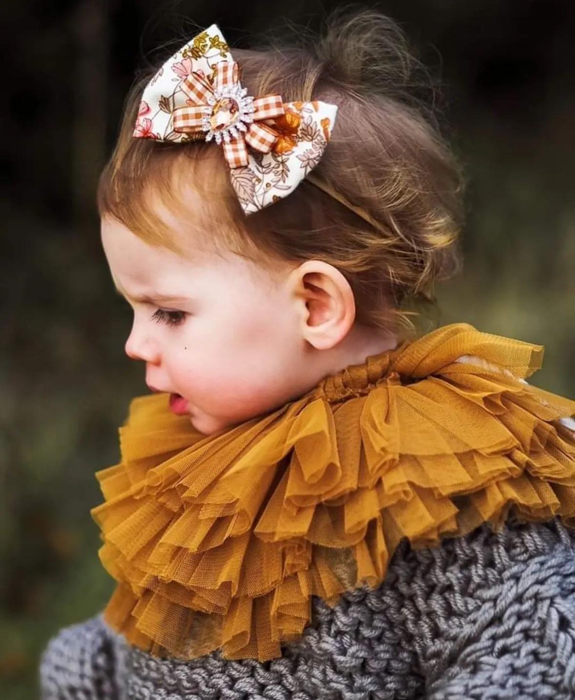 gold ruffle collar