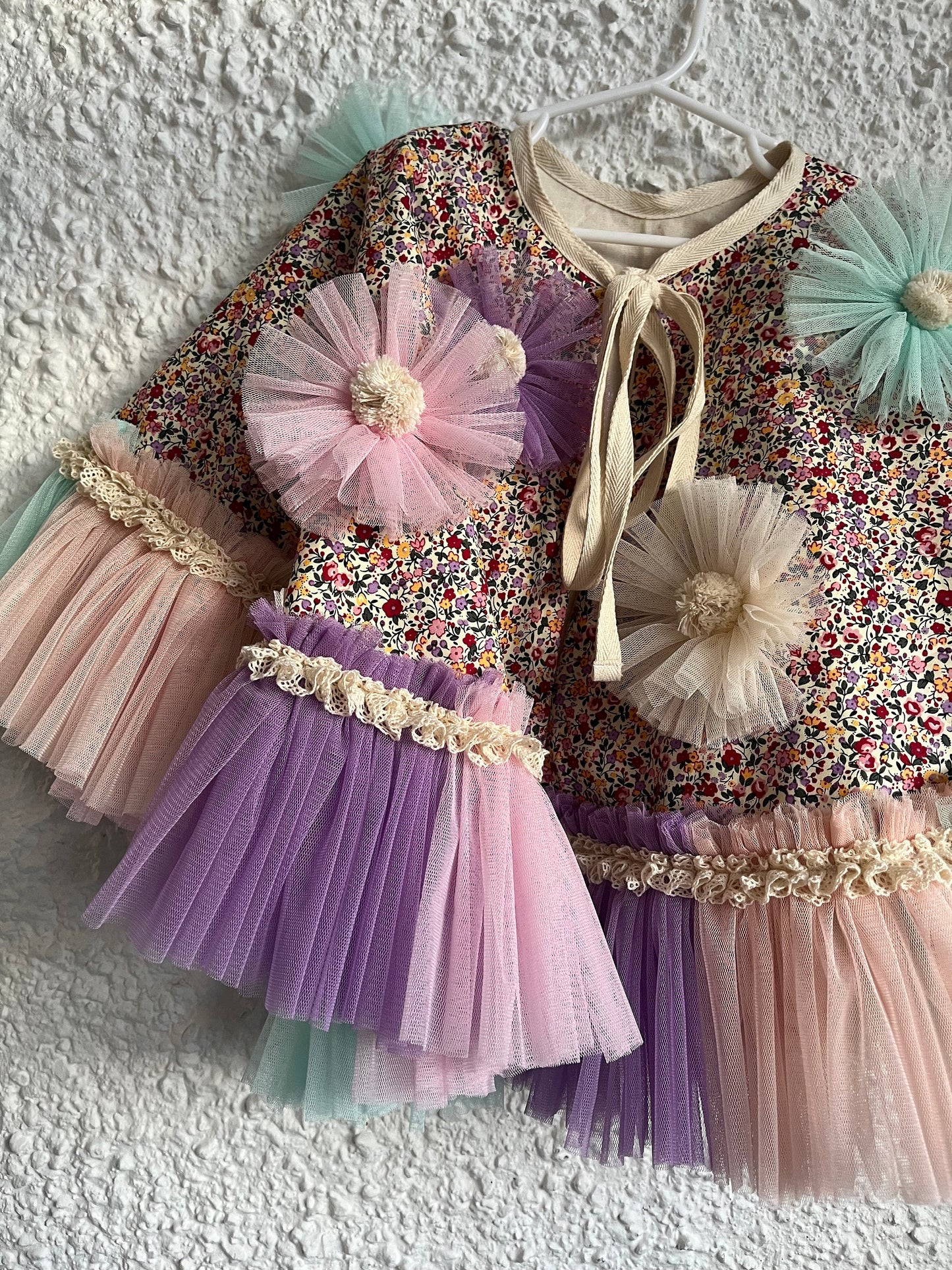 Ditsy floral frill cape in pink