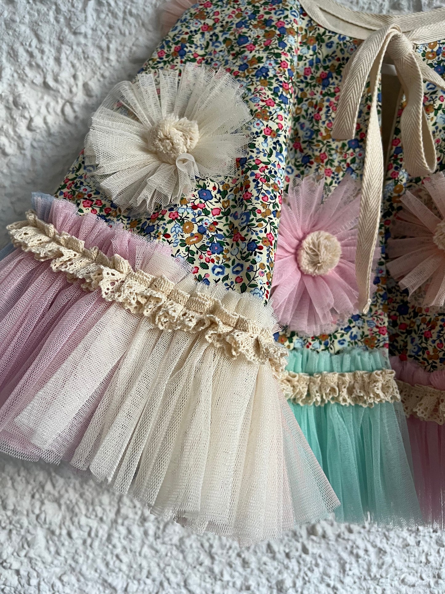 Ditsy floral frill cape in blue