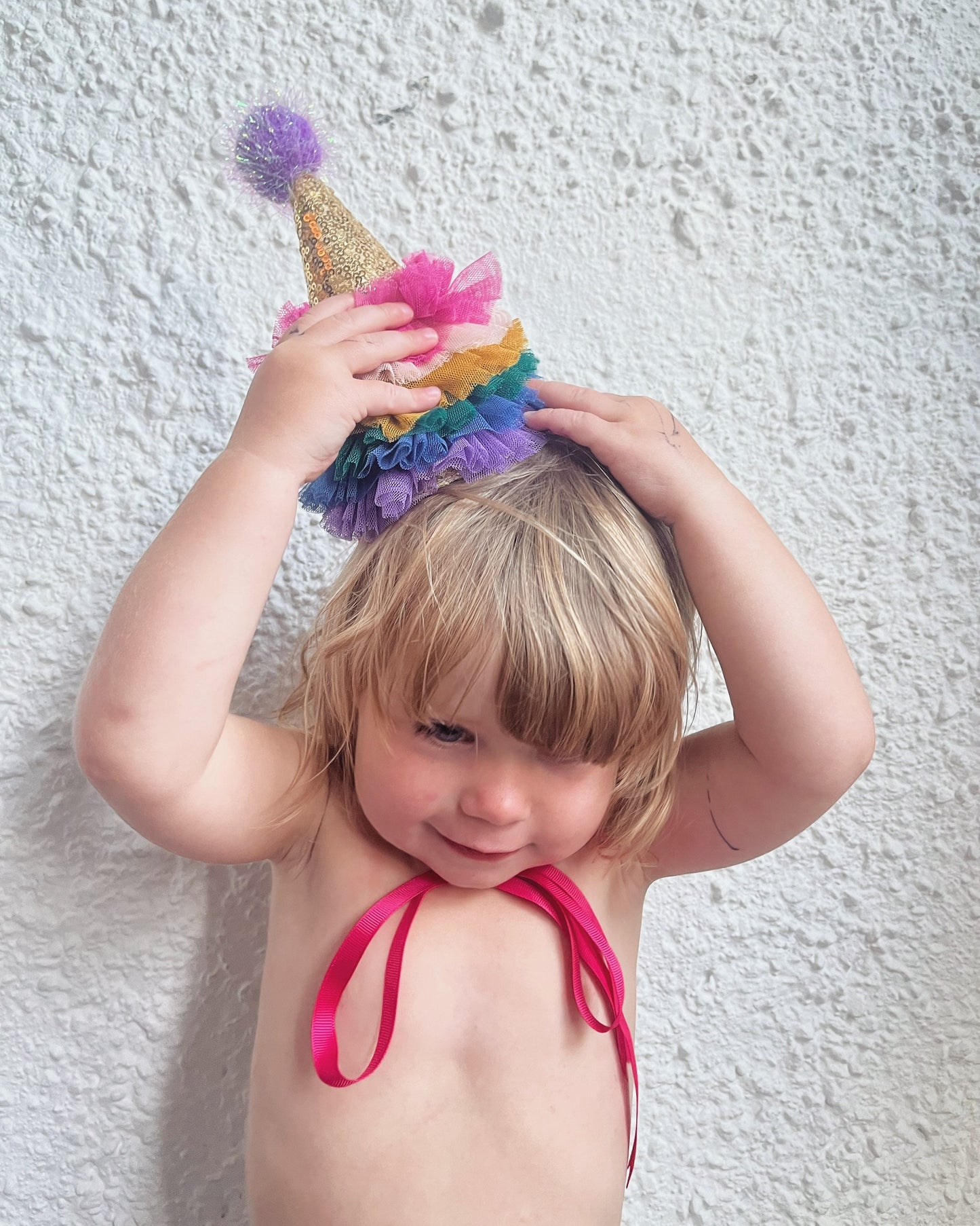 bright rainbow party hat