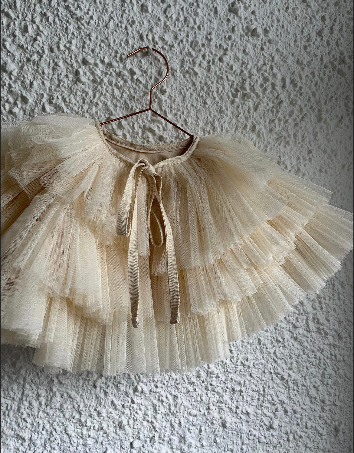 cream ruffle mini cape