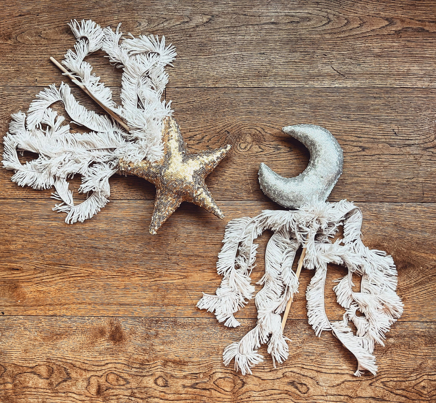 gold sequin wand with shaggy tassels