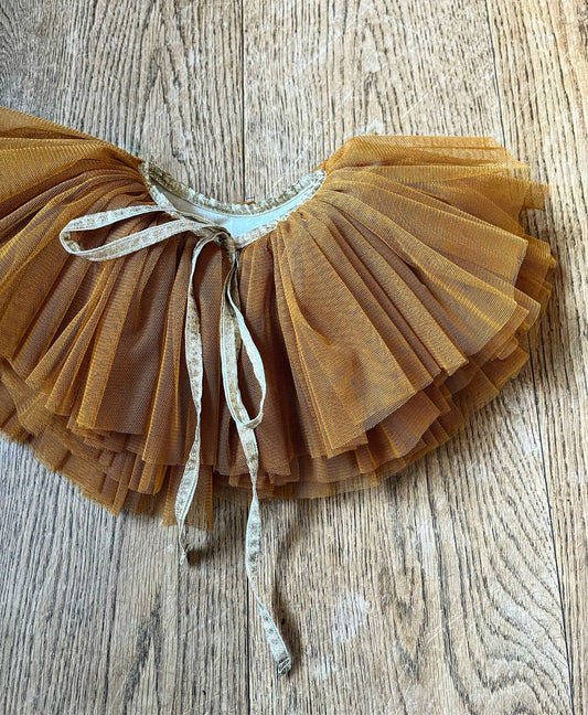gold ruffle collar