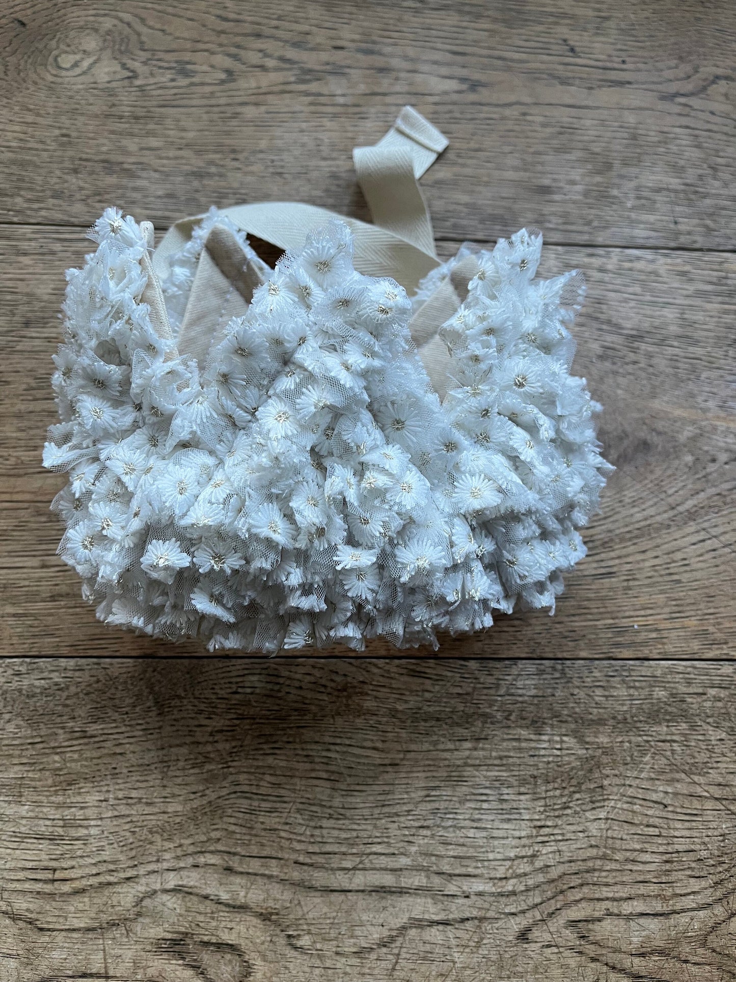 White embroidered daisy ruffle crown