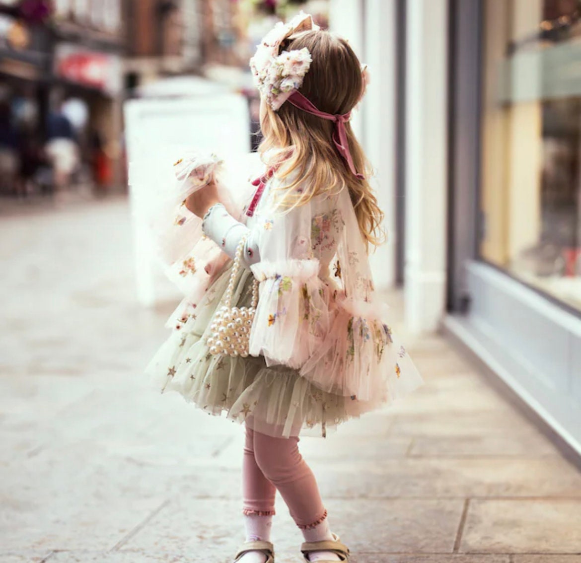 floral embroidered cape in pink