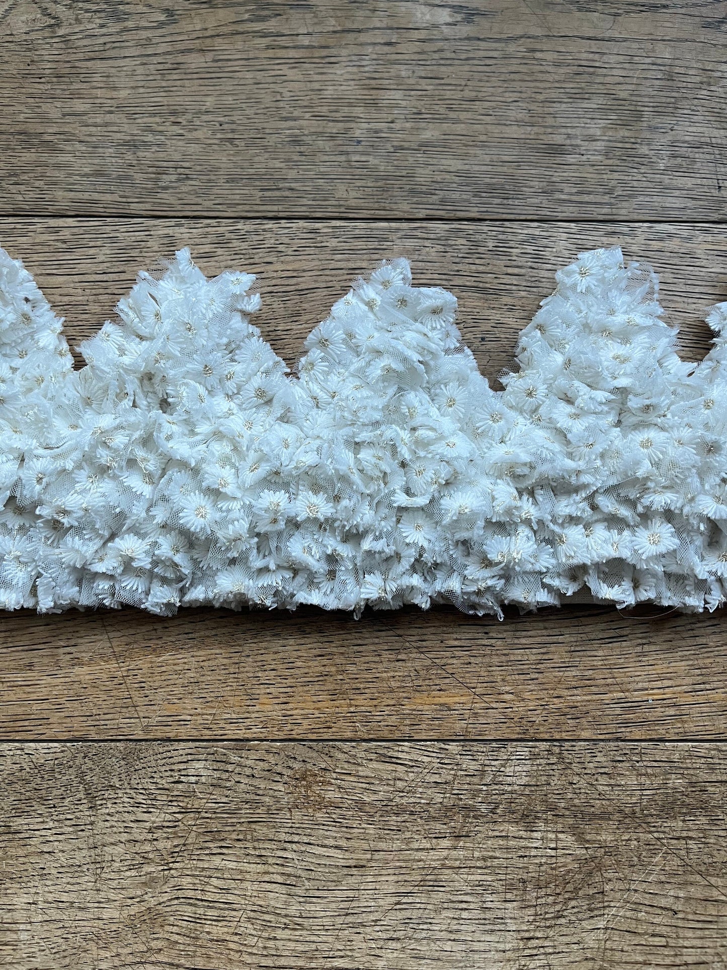 White embroidered daisy ruffle crown