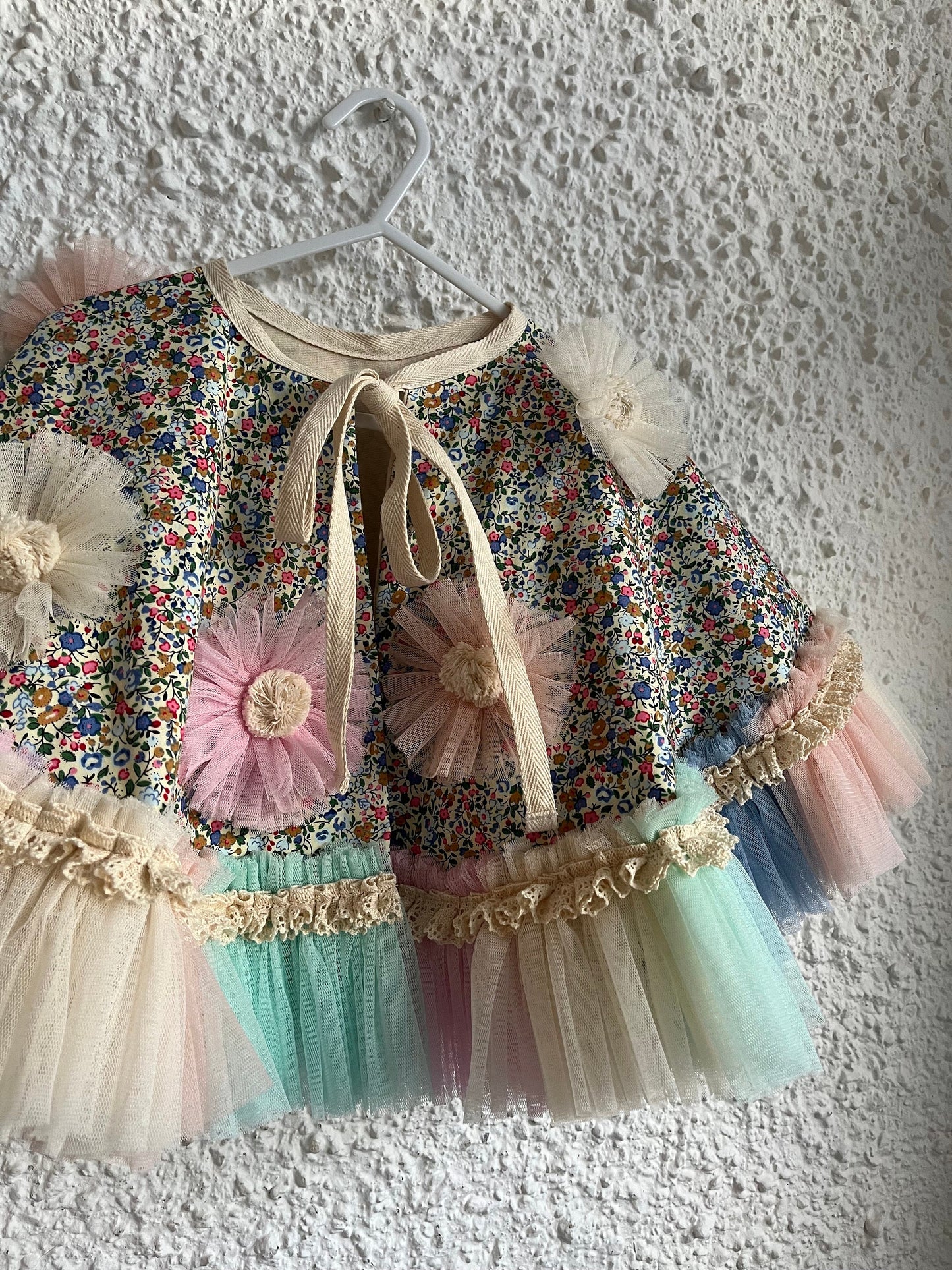 Ditsy floral frill cape in blue