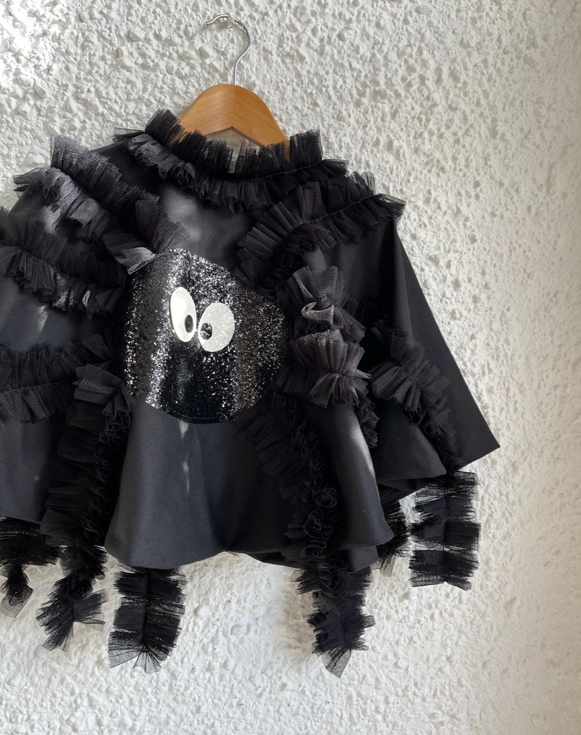 spider tie back cape