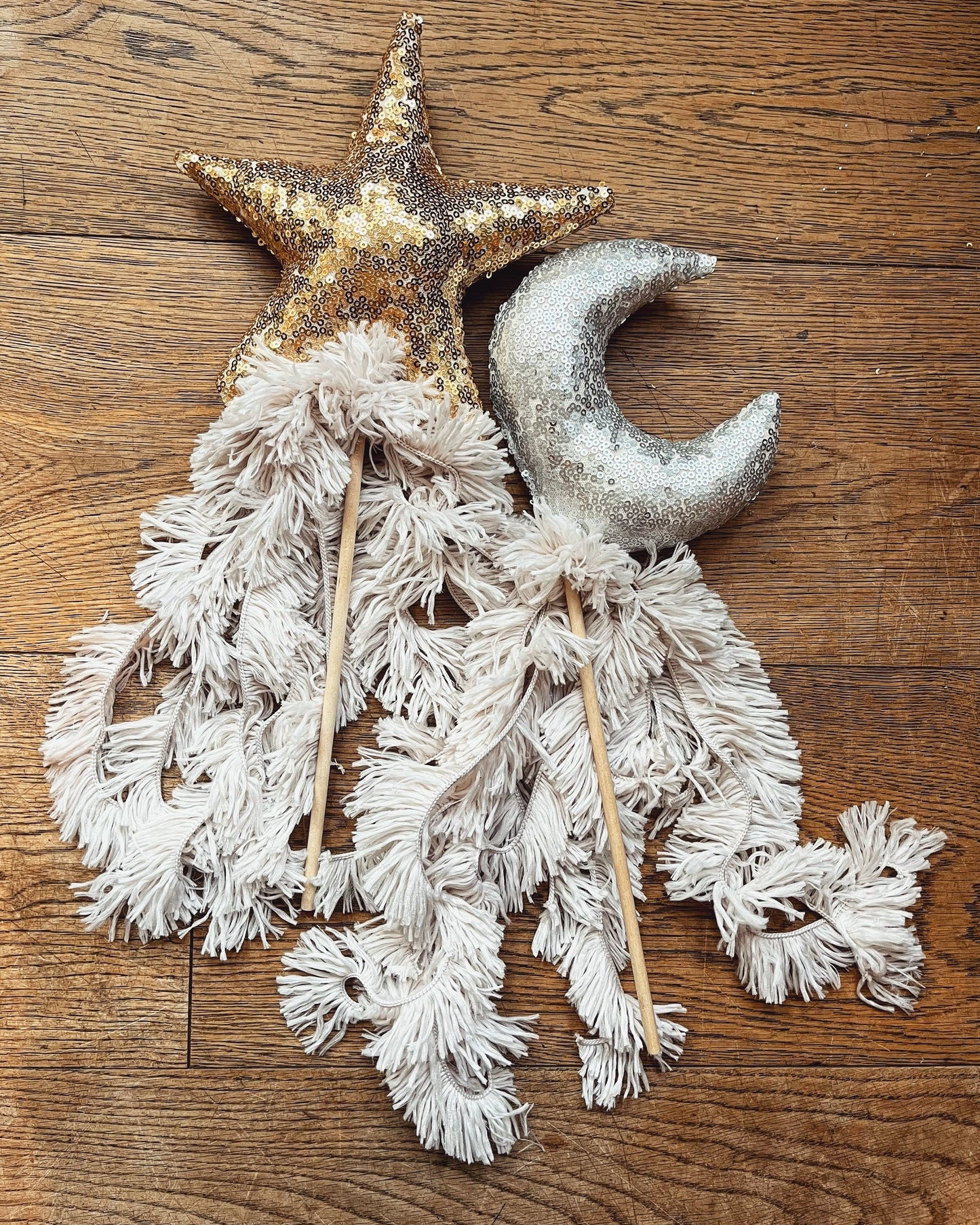 gold sequin wand with shaggy tassels